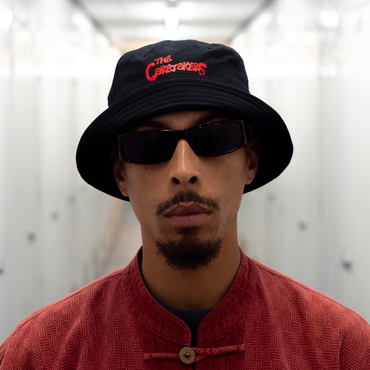 CARETAKERS BUCKET HAT - BLACK/RED