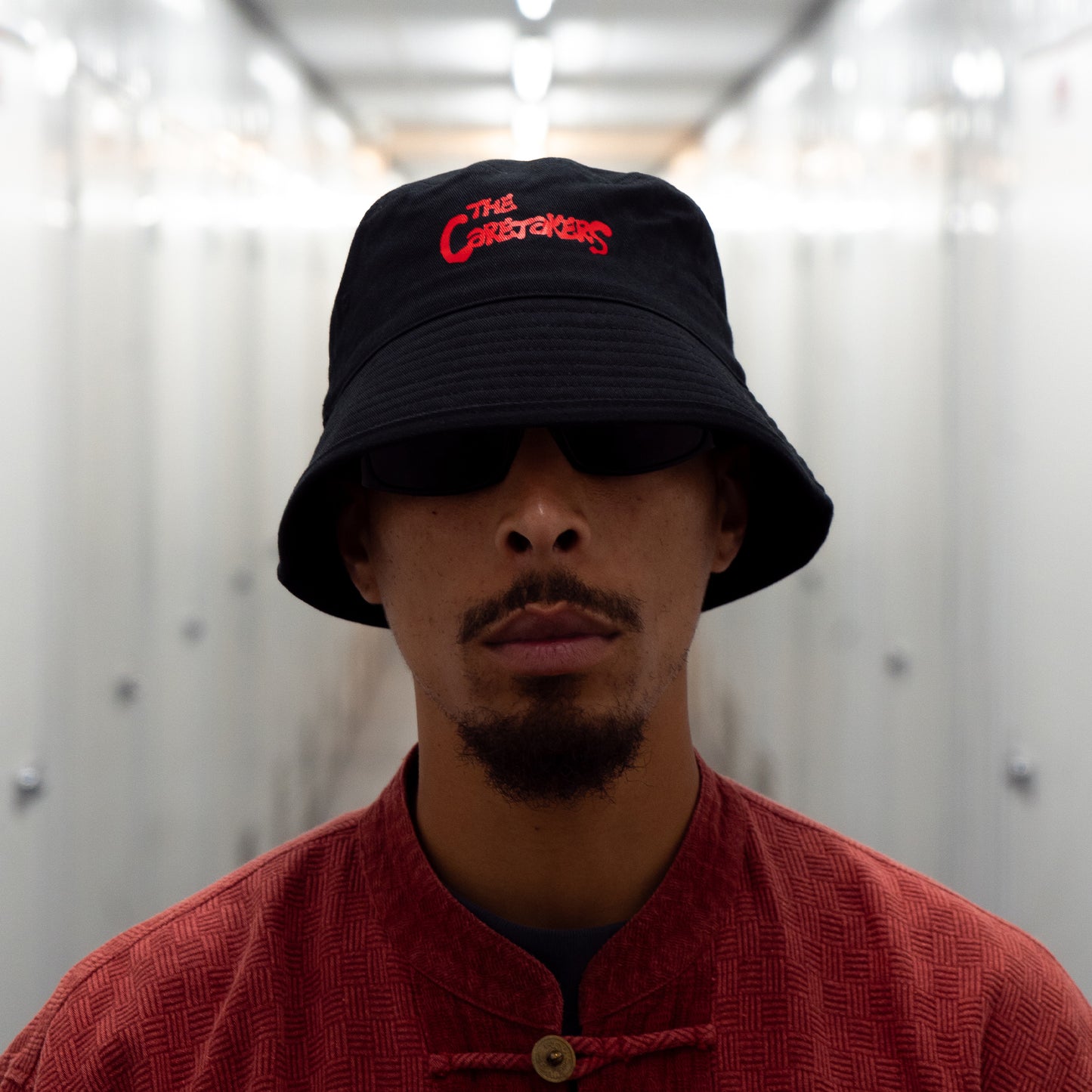 CARETAKERS BUCKET HAT - BLACK/RED